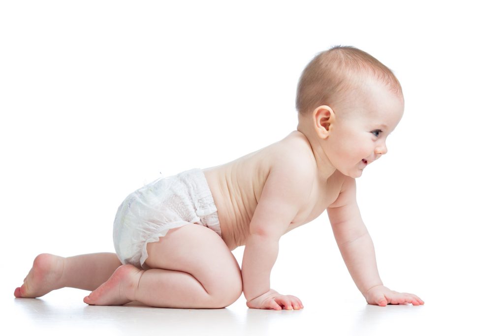 side view of pretty crawling baby girl